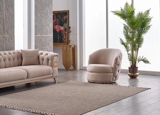 Poltrona design beige Chesterfield per soggiorno mobili imbottiti lusso