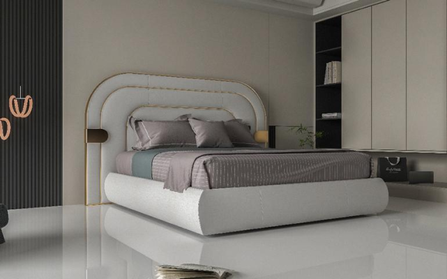 Letto grigio di lusso con accenti dorati design moderno e testiera imbottita