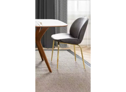 Una sedia senza confronto realizzata con materiali di alta qualità e acciaio inossidabile per la sala da pranzo.