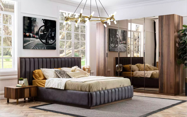 Set di mobili da camera da letto eleganti nello stile del minimalismo e con funzionalità.