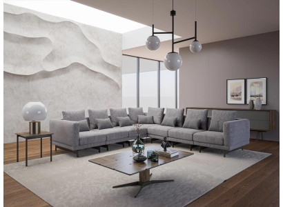 Nuovo divano angolare completo in tessuto a forma di L. Arredamento per il soggiorno con tavolino in legno.