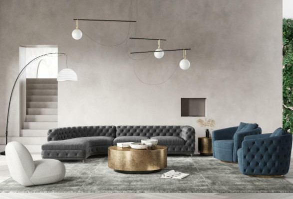 Divano Chesterfield design lounge in tessuto ad angolo a L con chaise longue.