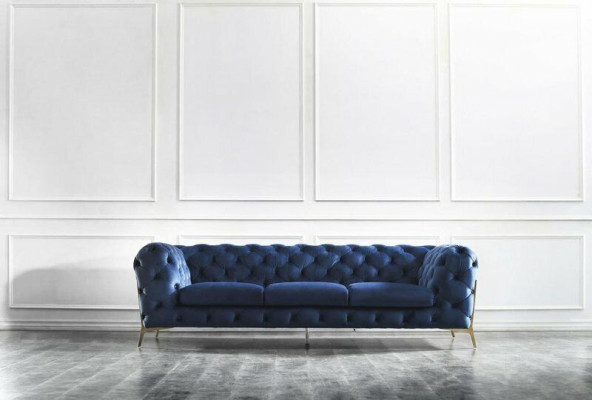 Chesterfield Divano di design di lusso in tessuto di velluto.