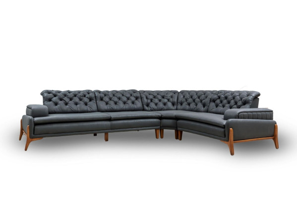 Divano ad angolo di lusso a forma di L con sistema audio moderno, grigio, imbottito in ecopelle.