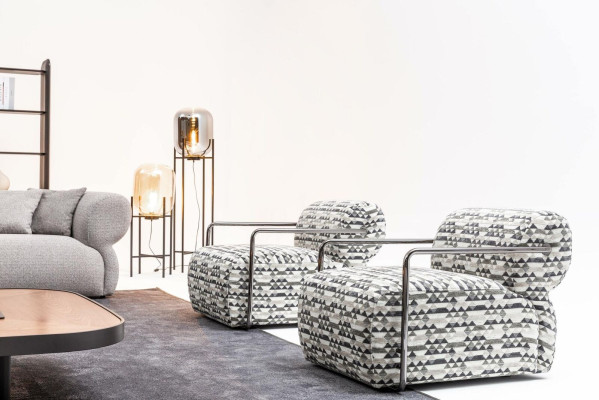 Poltrona design moderna monoposto di lusso in tessuto per soggiorno.