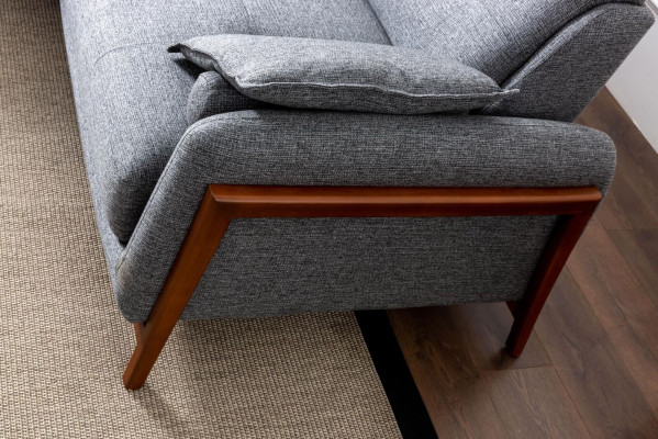 Divano angolare design a L in tessuto di lusso per arredamento da soggiorno.