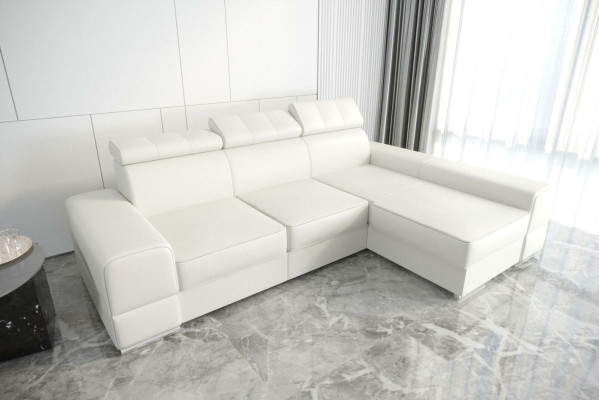 Divano ad angolo design a forma di L in pelle beige per soggiorno elegante di lusso con arredamento moderno.