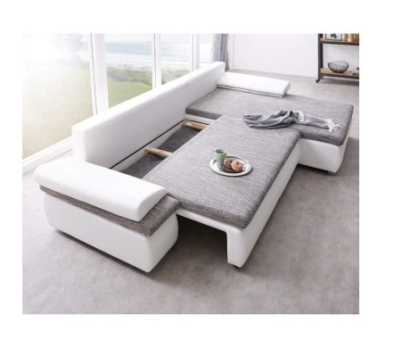 Divano angolare design trasformabile in letto con funzione divano in pelle tessile imbottito in tessuto.