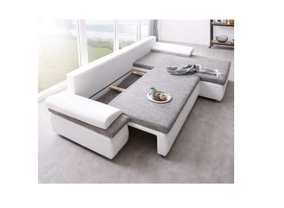 Divano angolare design trasformabile in letto con funzione divano in pelle tessile imbottito in tessuto.