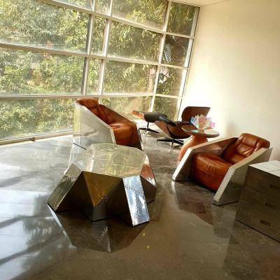 Poltrona da club stile Aviator design lounge in pelle cromata Art Deco cocktail.