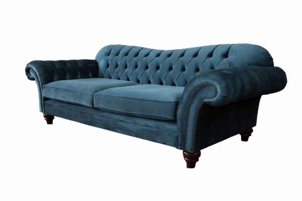 Divano turchese in tessuto di lusso Chesterfield. Divani blu con sedute imbottite di design.
