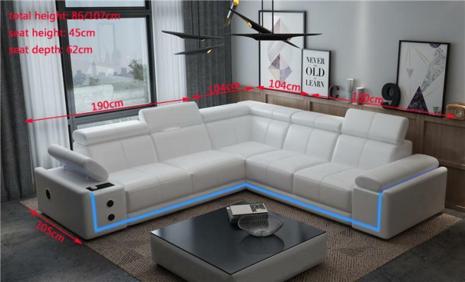 Divano ad angolo in pelle illuminata a forma di L con casse audio LED moderne.