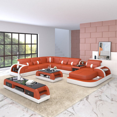 Divano a forma di U in pelle di design per il soggiorno con divano ad angolo e cuscini.