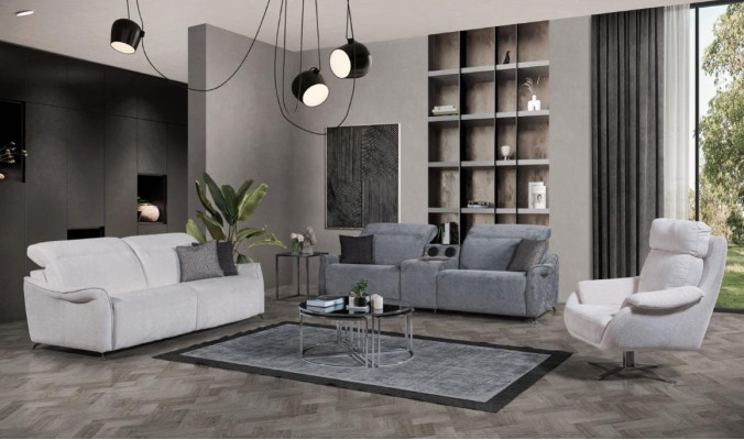 Set di lussuoso soggiorno con 2 divani a 3 posti con sistema audio e poltrona.