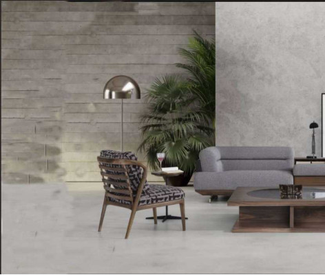 Set da soggiorno moderno con divano a L ad angolo, poltrona con tavolino da salotto design di lusso.