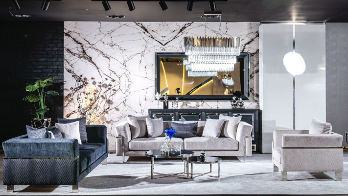 Set da salotto 3+1 in design con divano, specchio e tavolino da caffè.