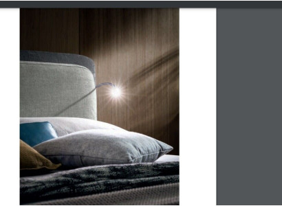 Doppi letti dell'hotel camera da letto tessile letti imbottiti design lusso legno Italia.