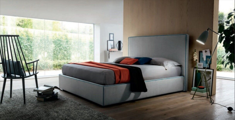 Lusso tessile per letti d'hotel imbottiti in tessuto italiano da designer in camera da letto.