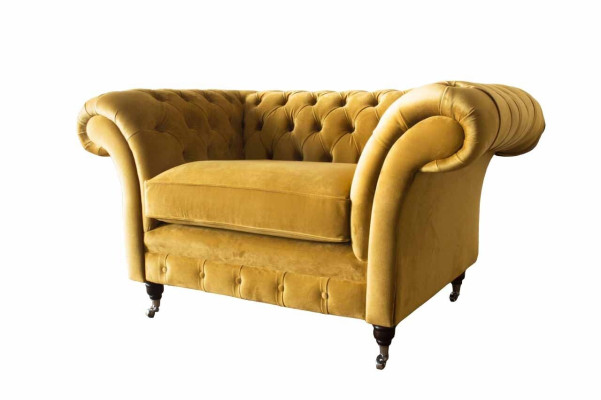 Poltrona Chesterfield in tessuto moderno di lusso per il soggiorno.