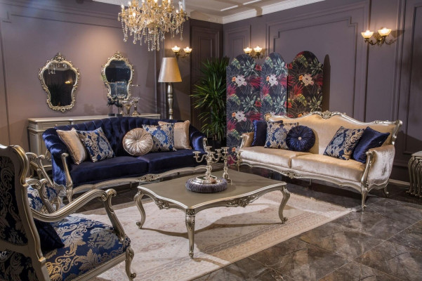 Poltrona monoposto di lusso imbottita in tessuto blu a motivo floreale, stile barocco.