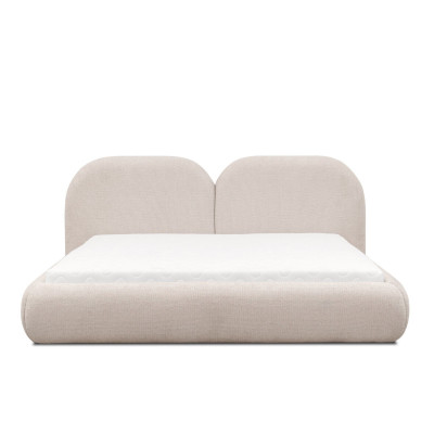 Camera da letto beige con letto matrimoniale, testiera rotonda in tessuto, letti imbottiti nuovi.