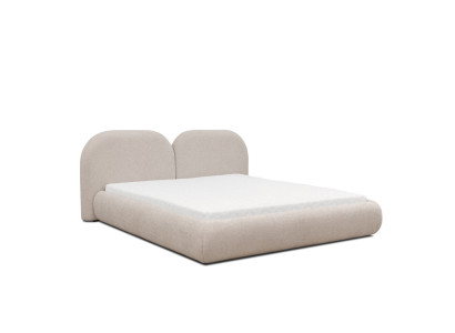Camera da letto beige con letto matrimoniale, testiera rotonda in tessuto, letti imbottiti nuovi.