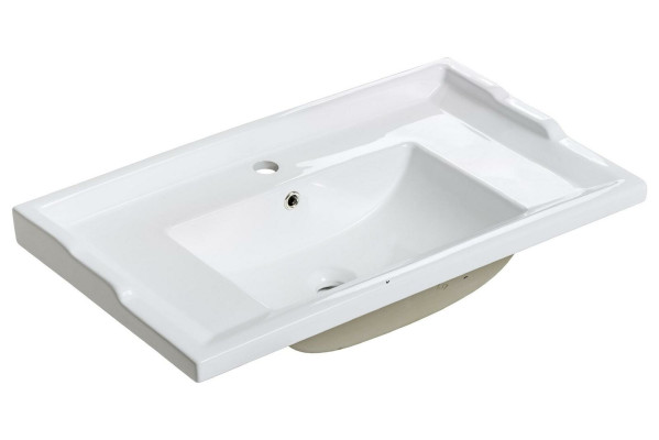 Lavabo da appoggio in ceramica bianco decorativo.