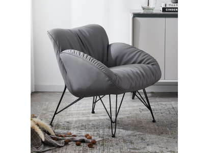 Poltrona di design in tessuto di lusso. Divano singolo da relax per lounge club con imbottitura.