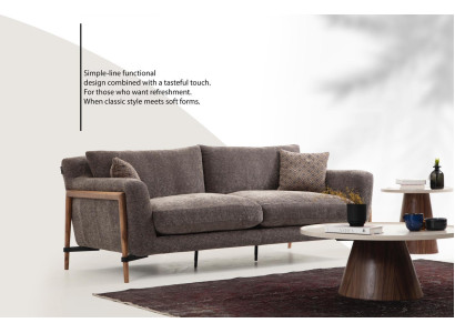 Divano a 4 posti in stoffa grigia dal design moderno per il soggiorno.