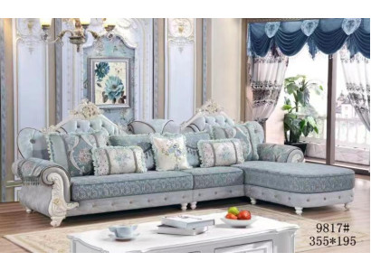 Divano d'angolo a L in tessuto di lusso blu per soggiorno.