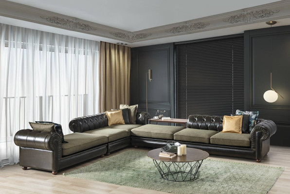 Salotto verde-nero Chesterfield a forma di L nuovo divano imbottito.