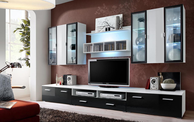Mobile TV design moderno in legno per soggiorno con parete attrezzata.