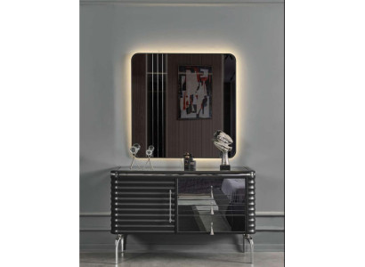 Set camera da letto nera con comò design e specchio a LED.