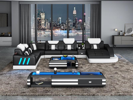 Design divano angolare illuminato in pelle con luci a LED.