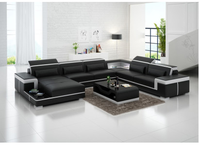 Comodo divano in pelle XXL con innovativa ergonomia e illuminazione a LED.
