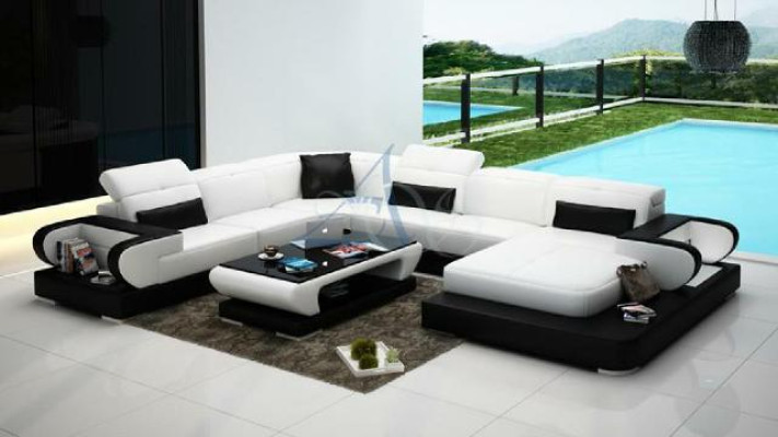 Divano ad angolo con funzione letto + USB a forma di U in ecopelle beige con funzione letto.