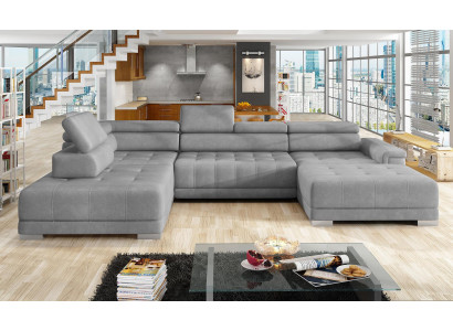 Divano ad angolo a U in tessuto di design con funzione letto.
