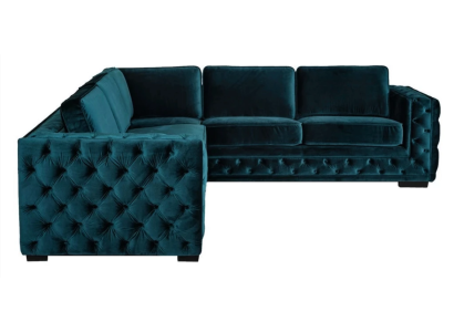 Divano a L a forma di angolo verde Chesterfield di design per arredamento salotto.