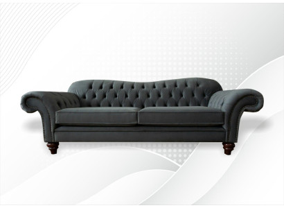 Divano Chesterfield XXL 4 posti in pelle e tessuto.