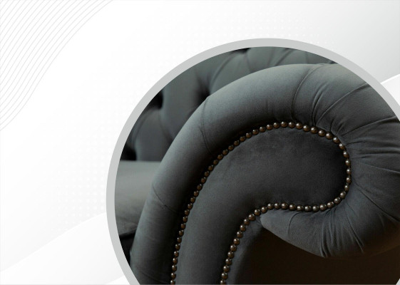 Divano Chesterfield XXL 4 posti in pelle e tessuto.