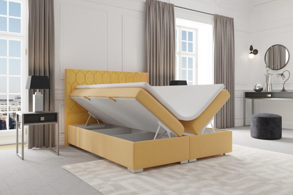 Letto boxspring Design dell'hotel in velluto di lusso con funzione di scrigno imbottito.