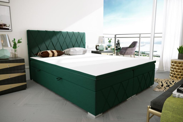 Letto matrimoniale completo con materasso a molle insacchettate e topper in scatola funzionale verde.