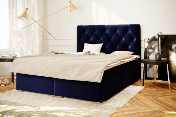 Letto boxspring doppio blu in tessuto di lusso con funzione di contenitore dell'hotel.
