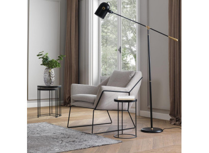 Poltrona singola in tessuto grigio in poliestere per il salotto.