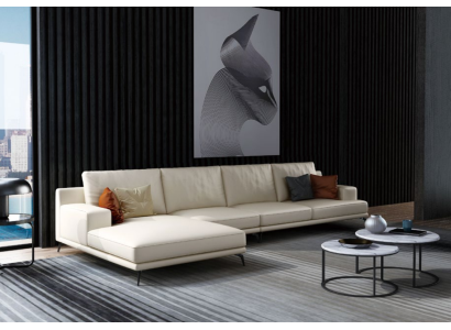 Garnitura divano design angolare con pouf imbottito.