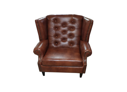 Lussuosa poltrona Chesterfield in pelle marrone, divano moderno.