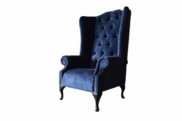 Poltrona design Chesterfield imbottita in lusso, tessuto blu, divano poltrona con schienale alto.