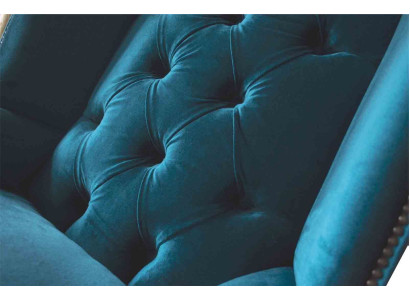 Poltrona grigia con poggiatesta, design Chesterfield in tessuto per il soggiorno.