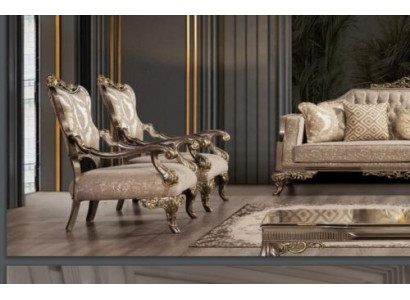 Una poltrona barocca di Chesterfield lussuosa, classica, in beige e oro.