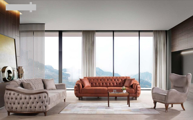 Divano Chesterfield arancione a tre posti in velluto con cuscini in legno.